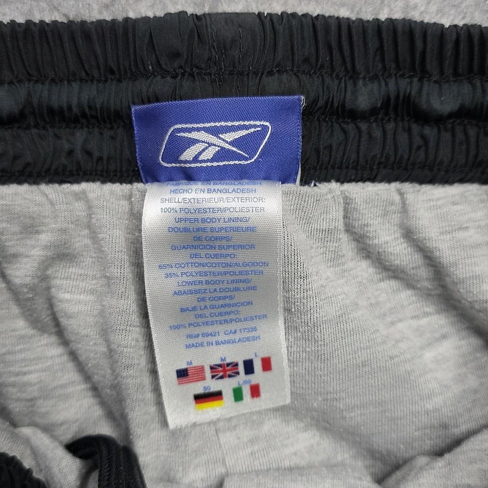 Reebok Pants‎ Mens Large Black Track Warm Up Athletic Side Stripe Zip Hem Lined